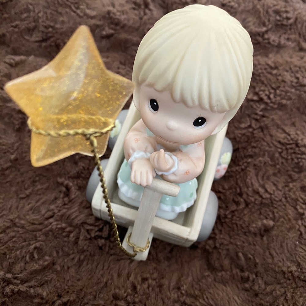 Wishing a world of peace precious moment